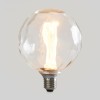 Лампа светодиодная филаментная Loft 271 G125FCE 4Вт 1800К E27 Voltega 8545